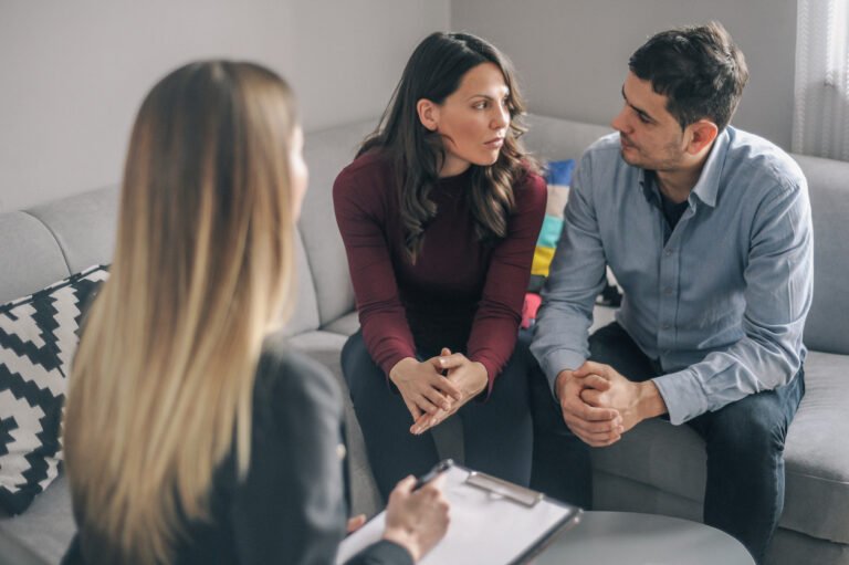 Expecting couple on home counseling meeting